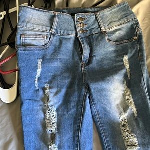 Between us faded ripped jeans